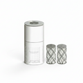 A white cylindrical air purifier or similar home appliance shown on a plain white background, alongside two dark gray cylindrical filter or accessory canisters.