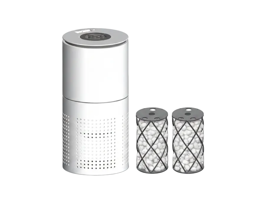 white air purifier alongside two metal air filters against white background